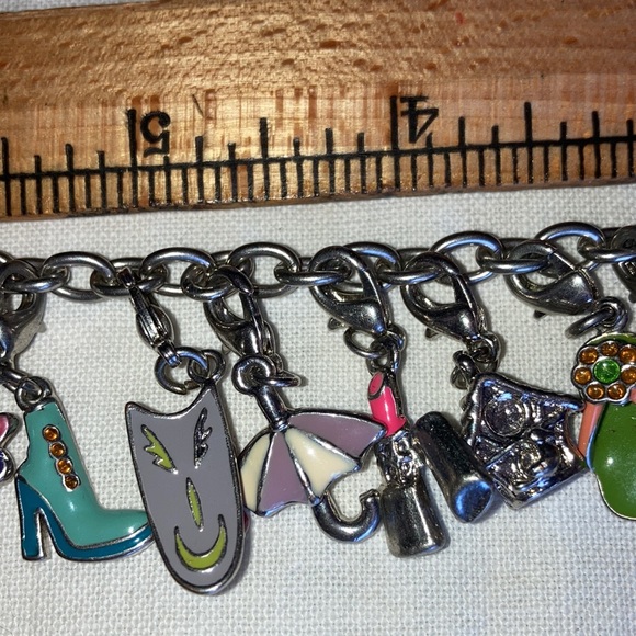 VTG st charm bracelet loaded w/cute bright enameled colors, 8” chain. $45 - Picture 5 of 7
